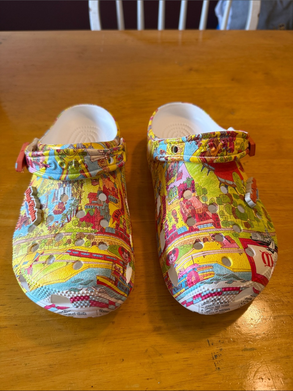 Disney 50th anniversary Magic Kingdom Crocs in women’s size 8, men’s size 6.